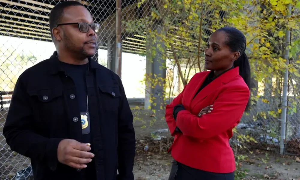 two detectives discussing a case from the movie trust not